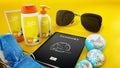 Passport, sunglasses, sunbed, sun cream, globes and towel. 3D illustration