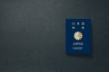 Japan Passport on dark background with copy space - 3D Illustration