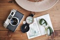 Passport, vintage camera, compass, sunglasses and hat. Royalty Free Stock Photo