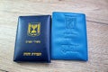 Passports Israel non biometric and biometric on a wooden background