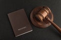 Passports and judge gavel on gray black background. Legal immigration. Obtain citizenship Royalty Free Stock Photo