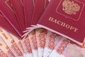 Passports of Russia lying on Russian banknotes,Money in denominations of 5,000 rubles.ÃÂ¡oncept of change, receipt, payment of