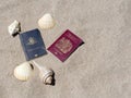 Passports on sandy tropical beach copyspace Royalty Free Stock Photo