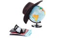 Passports, tickets, globe as a vacation concept. Summer journey preparation. Holidays, checking documents, choosing destination po