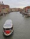 Passsenger ferry floating by grand canal in Venice Royalty Free Stock Photo