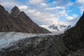 Passu glacier in surrounded by Karakoram mountain range in summer season view from Patundas trekking route at sunrise, Gilgit Royalty Free Stock Photo