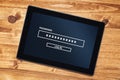 Password protected digital tablet computer on office desk, top v Royalty Free Stock Photo