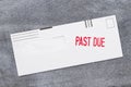 Past Due word message on envelope on a weathered stone Royalty Free Stock Photo