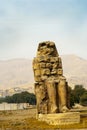 The Colossi of Memnon are two massive statues of Pharaoh Amenhotep III.