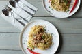 Pasta aglio e olio with tuna. Italian cuisine, tagliatelle with olive oil, garlic, parsley and chili. Royalty Free Stock Photo