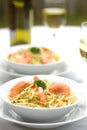 Pasta Alfredo with grilled shrimps Royalty Free Stock Photo