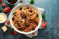 Pasta Alla Puttanesca with garlic, olives, capers, tomato and anchois fish Royalty Free Stock Photo