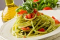 Pasta with arugula pesto and cherry tomatoes Royalty Free Stock Photo