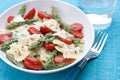 Pasta with asparagus and tomatoes Royalty Free Stock Photo