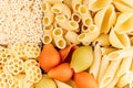 Pasta background assortment of different kinds italian macaroni in chess cells top view.