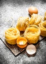 Pasta background. Cooking homemade pasta with egg and flour. Royalty Free Stock Photo