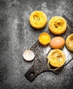 Pasta background. Cooking homemade pasta with egg and flour. Royalty Free Stock Photo