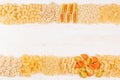 Pasta background decorative border of assortment different kinds italian macaroni. Royalty Free Stock Photo