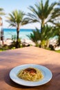Pasta on the background of the sea. The concept of relaxing. Royalty Free Stock Photo