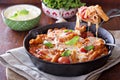 Pasta bake with penne, tomatoes and mozarella Royalty Free Stock Photo