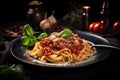 pasta bolognese with basil in plate on dark background. Rustic style Royalty Free Stock Photo