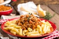 Pasta bolognese. Pasta served with a sauce of ground beef meat, tomato, onion, carrot and thyme Royalty Free Stock Photo