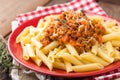 Pasta bolognese. Pasta served with a sauce of ground beef meat, tomato, onion, carrot and thyme Royalty Free Stock Photo