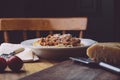 Pasta bolognese spaghetti bolognese and parmesan on a white plate. The classic italian spaghetti on old wooden background Royalty Free Stock Photo