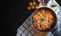 Pasta Bolognese tomatoes sauce in frying pan with fresh ingredient on wooden tray Royalty Free Stock Photo