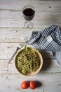 Pasta in a bowl along with a drink on a background. Royalty Free Stock Photo
