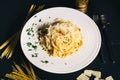 pasta carbonara with bacon, parmesan, yolk and creamy sauce served as main dish in restaurant Royalty Free Stock Photo