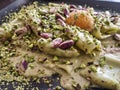 Pasta carbonara with pistachio italian food closeup Royalty Free Stock Photo