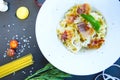 Pasta Carbonara. Spaghetti with bacon and parmesan cheese on dark background Royalty Free Stock Photo