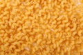 Pasta cavatappi texture use as a background. Macaroni, noodle, and spaghetti in stock. Raw and dry flour product. Royalty Free Stock Photo