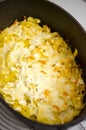 Pasta with cheese and butter in castiron pot