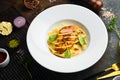 Pasta with chicken fillet, cheese and spinach. Italian cuisine. Menu. Royalty Free Stock Photo