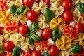 Pasta colored farfalle salad with tomatoes, mozzarella and basil