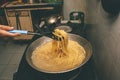 Pasta is cooked in boiling water in a pan Royalty Free Stock Photo