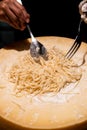 Pasta cooking in cheese bowl Royalty Free Stock Photo