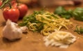 Pasta dinner ingredients laying on table Royalty Free Stock Photo