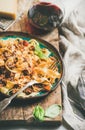 Pasta dinner with tagliatelle bolognese and red wine in glass Royalty Free Stock Photo