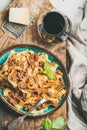 Pasta dinner with tagliatelle bolognese and red wine, top view Royalty Free Stock Photo