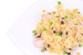 Pasta farfalle with ham and mushrooms. Royalty Free Stock Photo