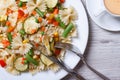 Pasta farfalle with vegetables and coffee top view closeup Royalty Free Stock Photo