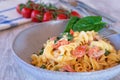 Pasta with feta cheese tomatoes and spinach