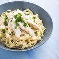 Pasta fettuccine alfredo with chicken, parmesan and parsley Royalty Free Stock Photo