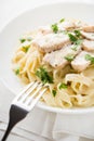 Pasta fettuccine alfredo with chicken, parmesan and parsley Royalty Free Stock Photo