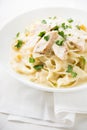 Pasta fettuccine alfredo with chicken, parmesan and parsley Royalty Free Stock Photo