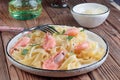 Pasta fettuccine with shrimp in rustic plate with fork Royalty Free Stock Photo