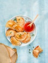 Pasta filled with tuna, tomato sauce, bell pepper and boiled egg called empanadilla. Mediterranean Spanish food Royalty Free Stock Photo